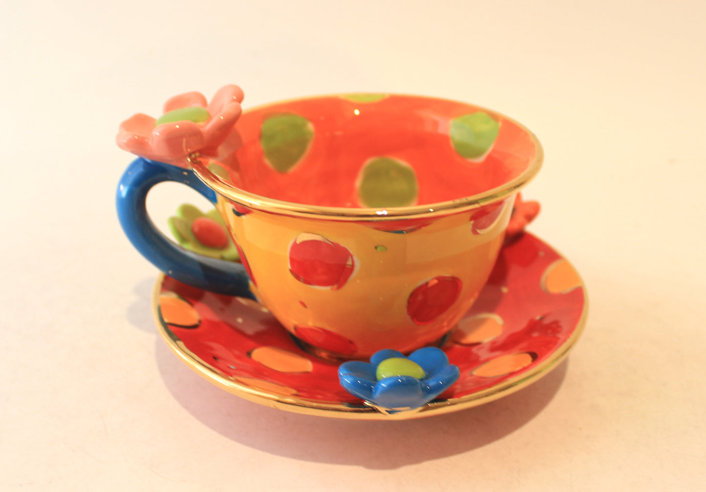 Daisy Cup and Saucer Yellow Orange and Red