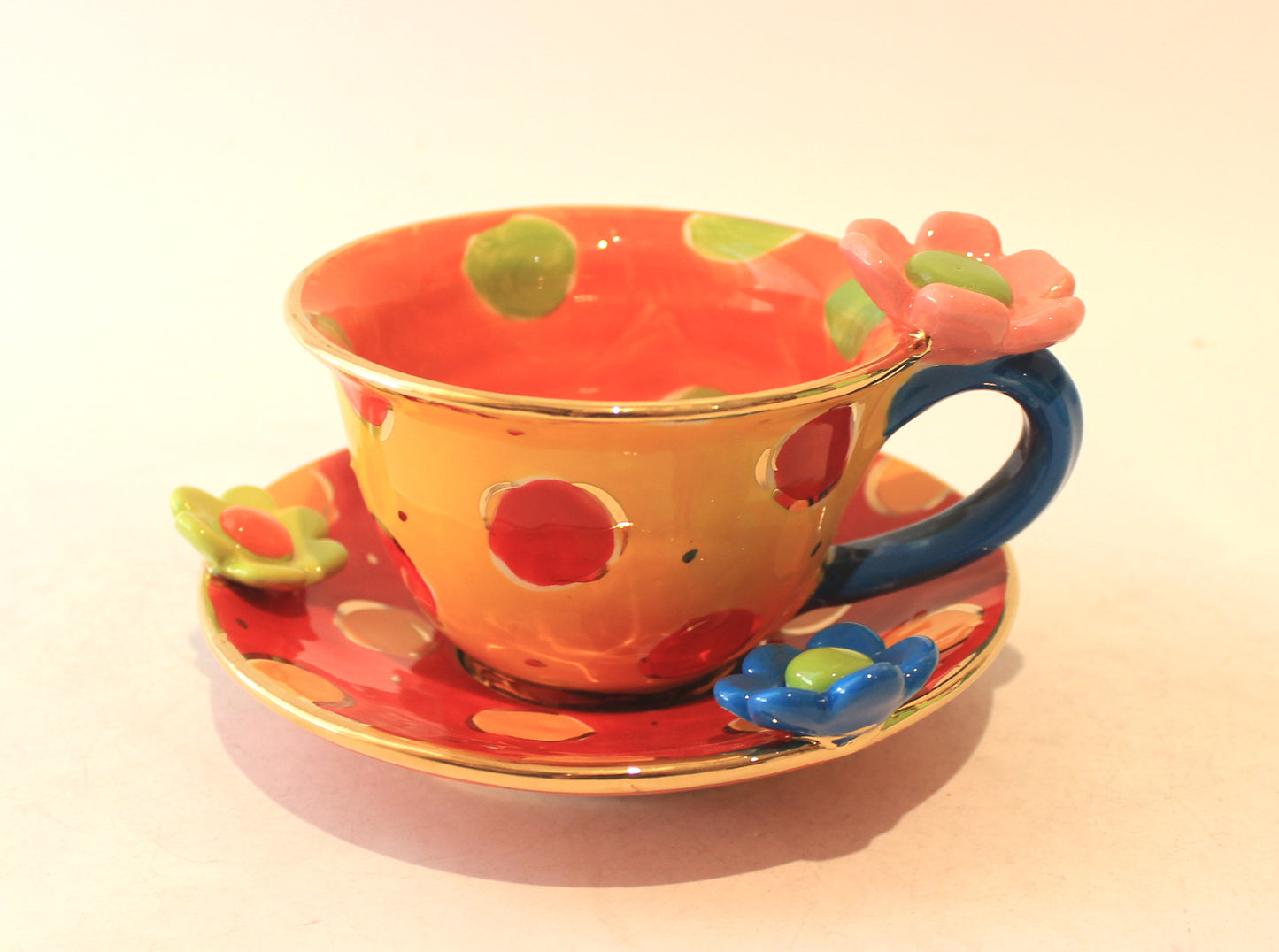 Daisy Cup and Saucer Yellow Orange and Red