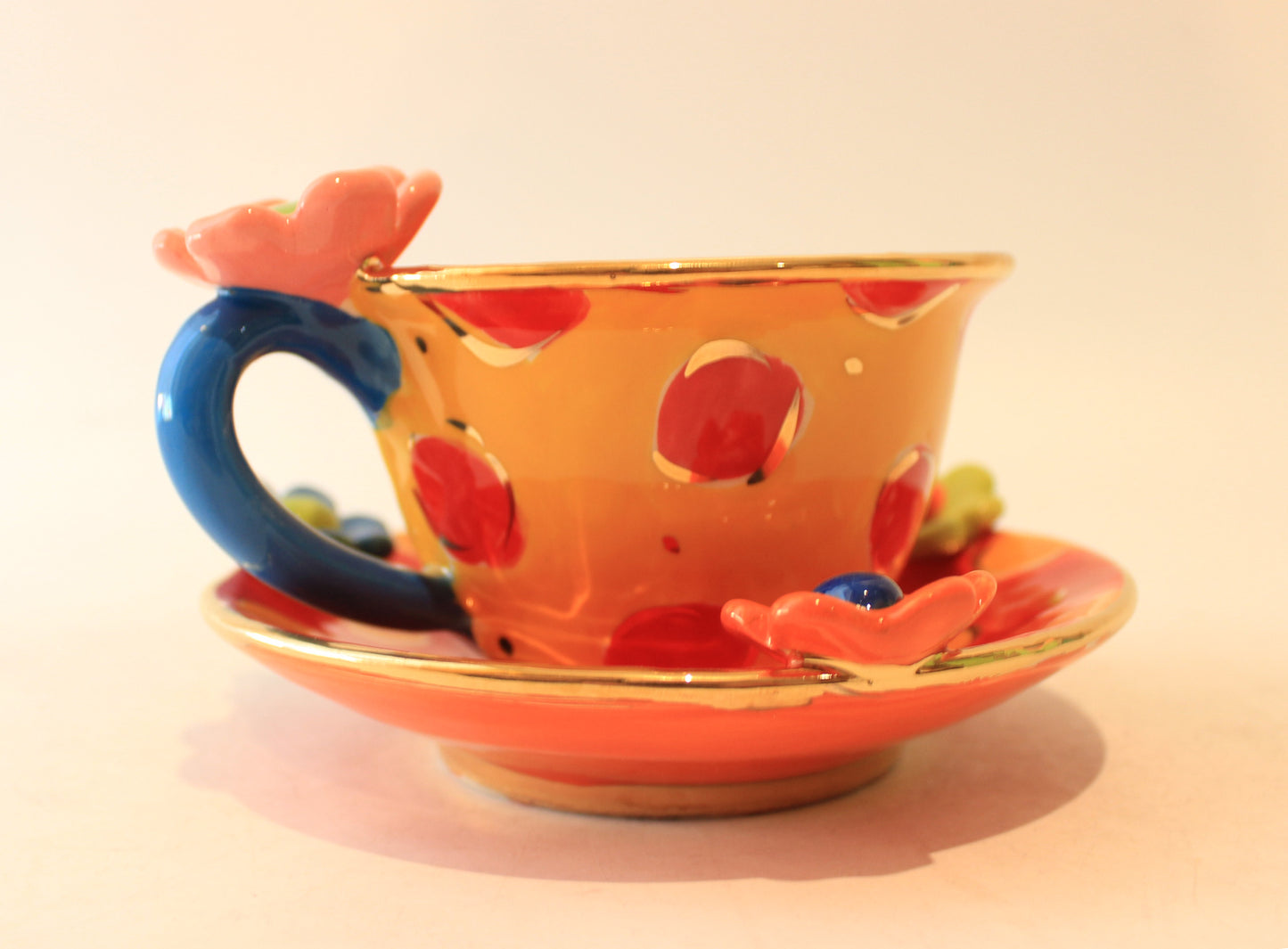 Daisy Cup and Saucer Yellow Orange and Red