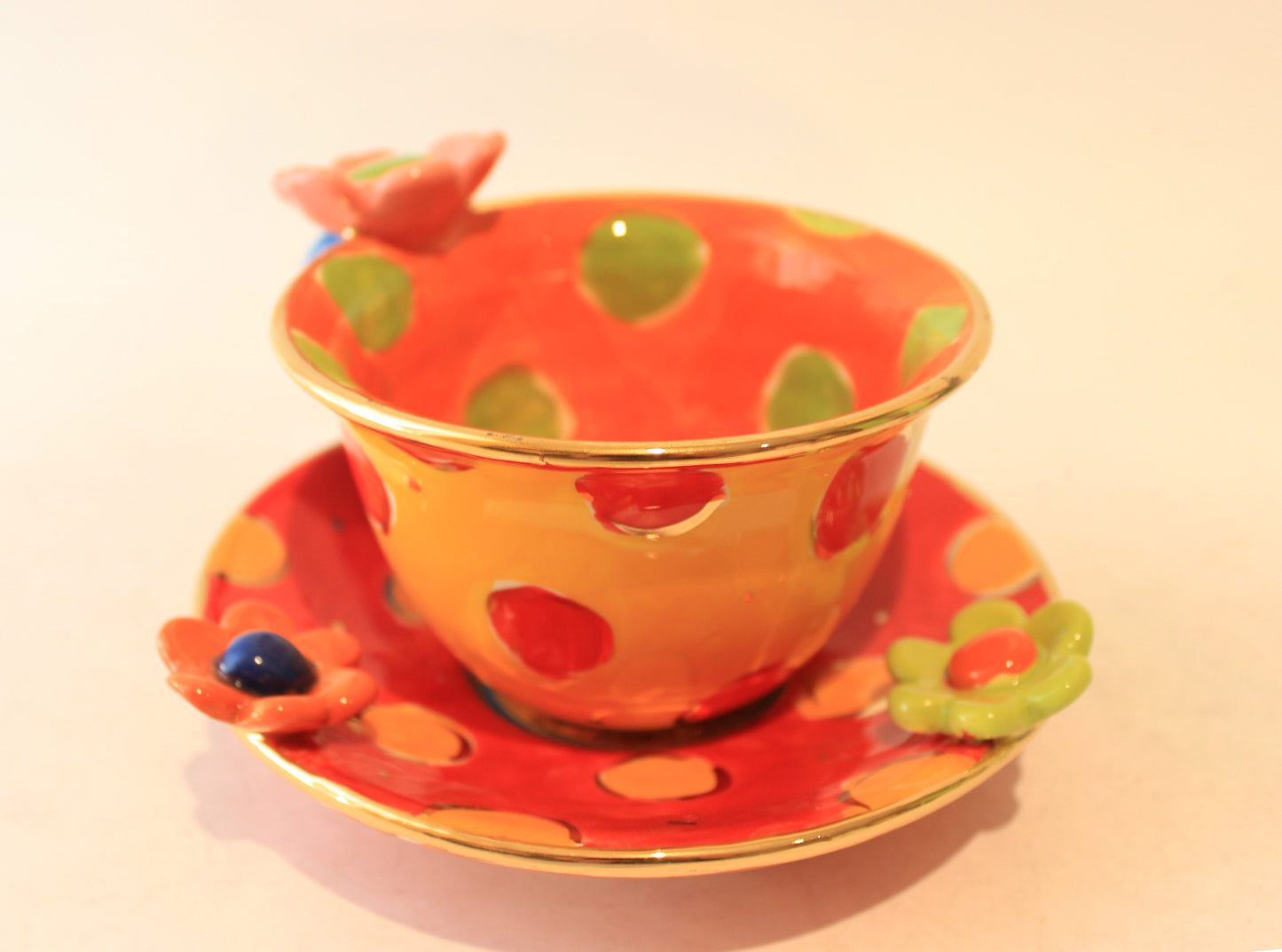 Daisy Cup and Saucer Yellow Orange and Red