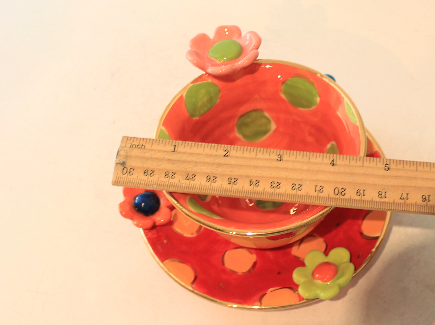 Daisy Cup and Saucer Yellow Orange and Red