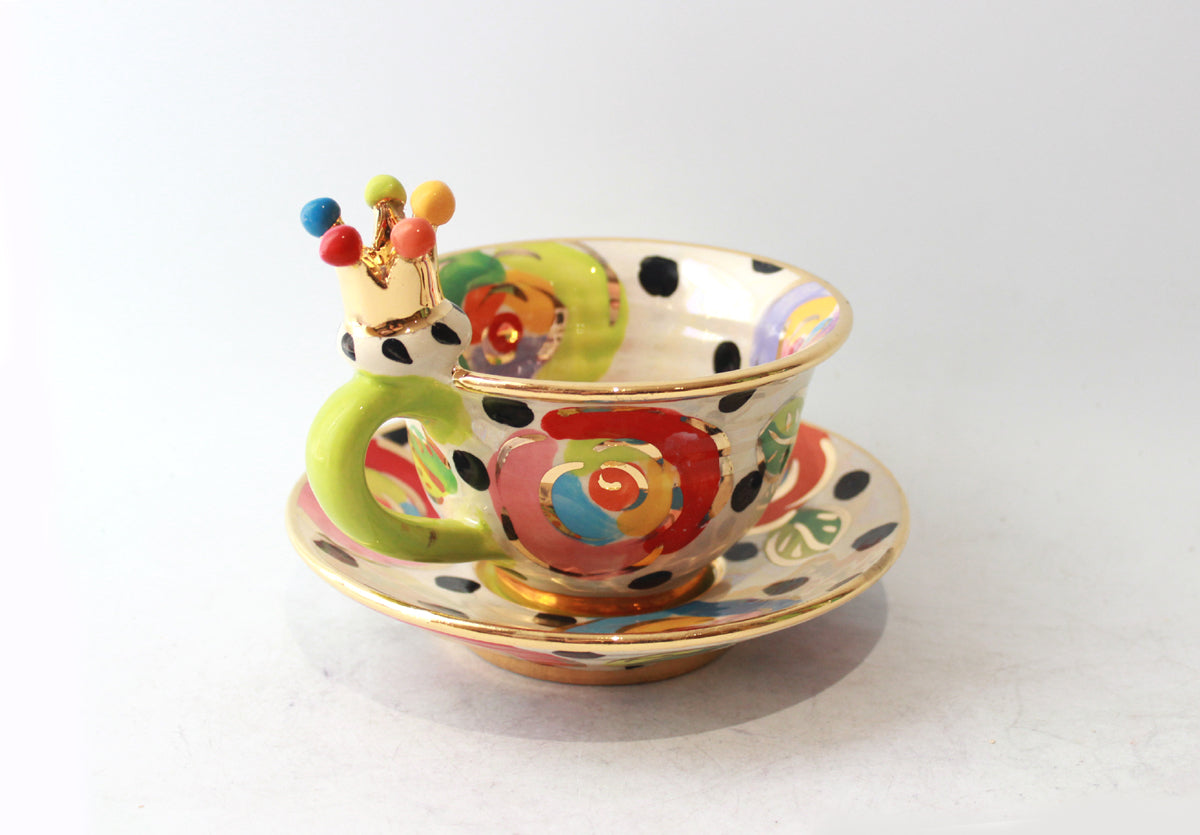 Crown Handled Cup and Saucer in Gold New Rose on Black Dot