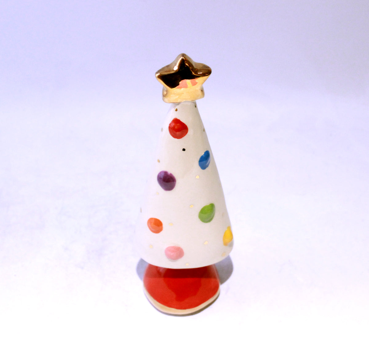 Small Christmas Tree in White with Coloured Ornaments and a Red Base