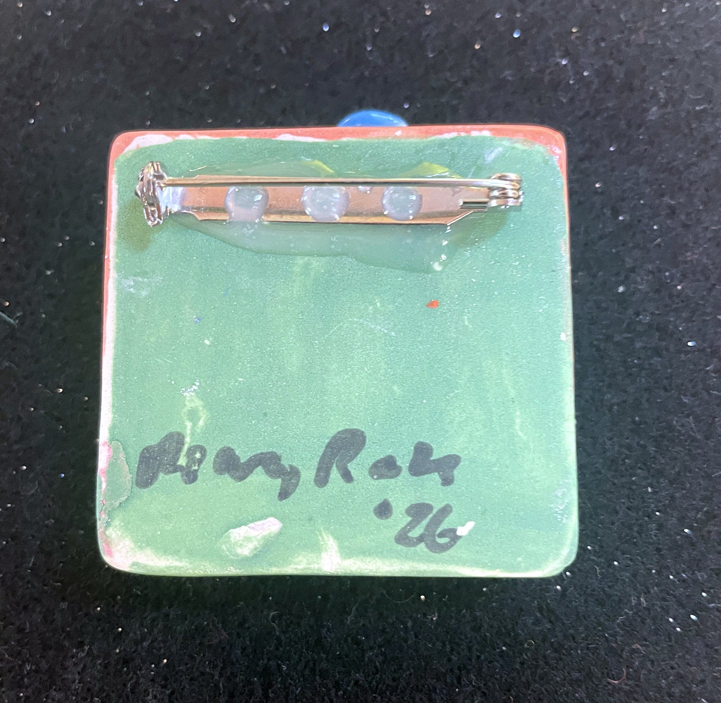 Brooch with Peach and Green background