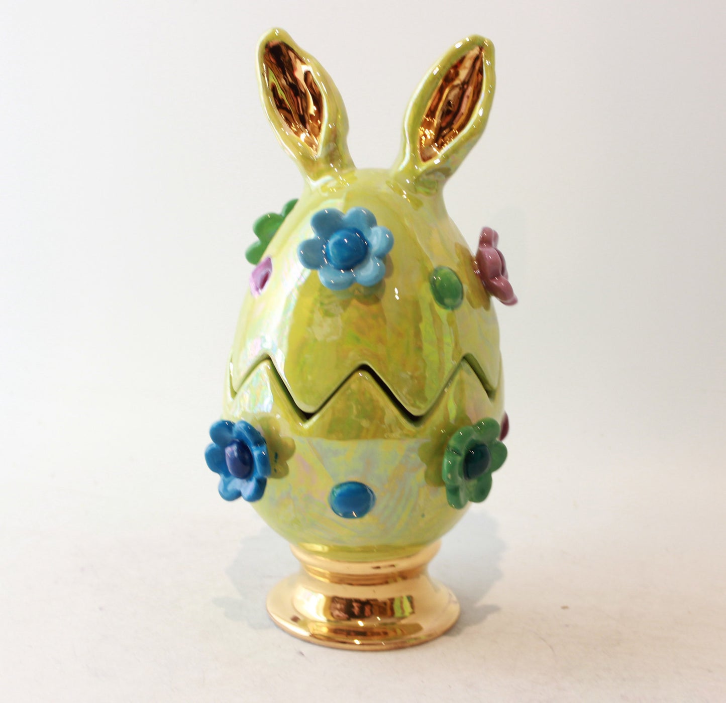 Easter Egg in Green with Ears Daisies and Bobbles