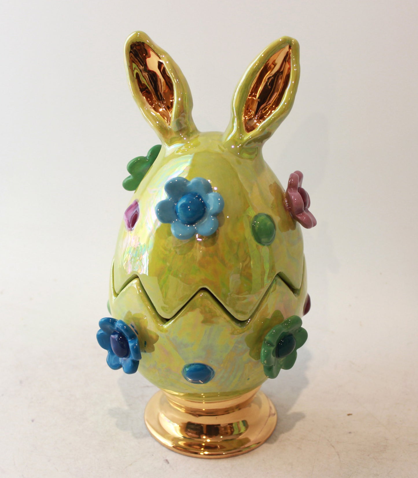 Easter Egg in Green with Ears Daisies and Bobbles