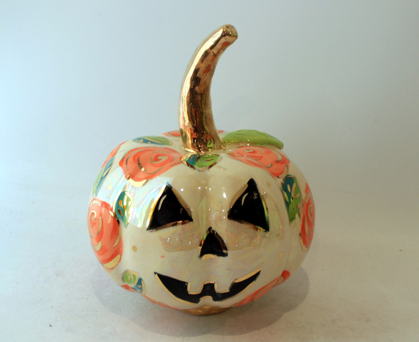 Large Pumpkin with Face and Orange Roses