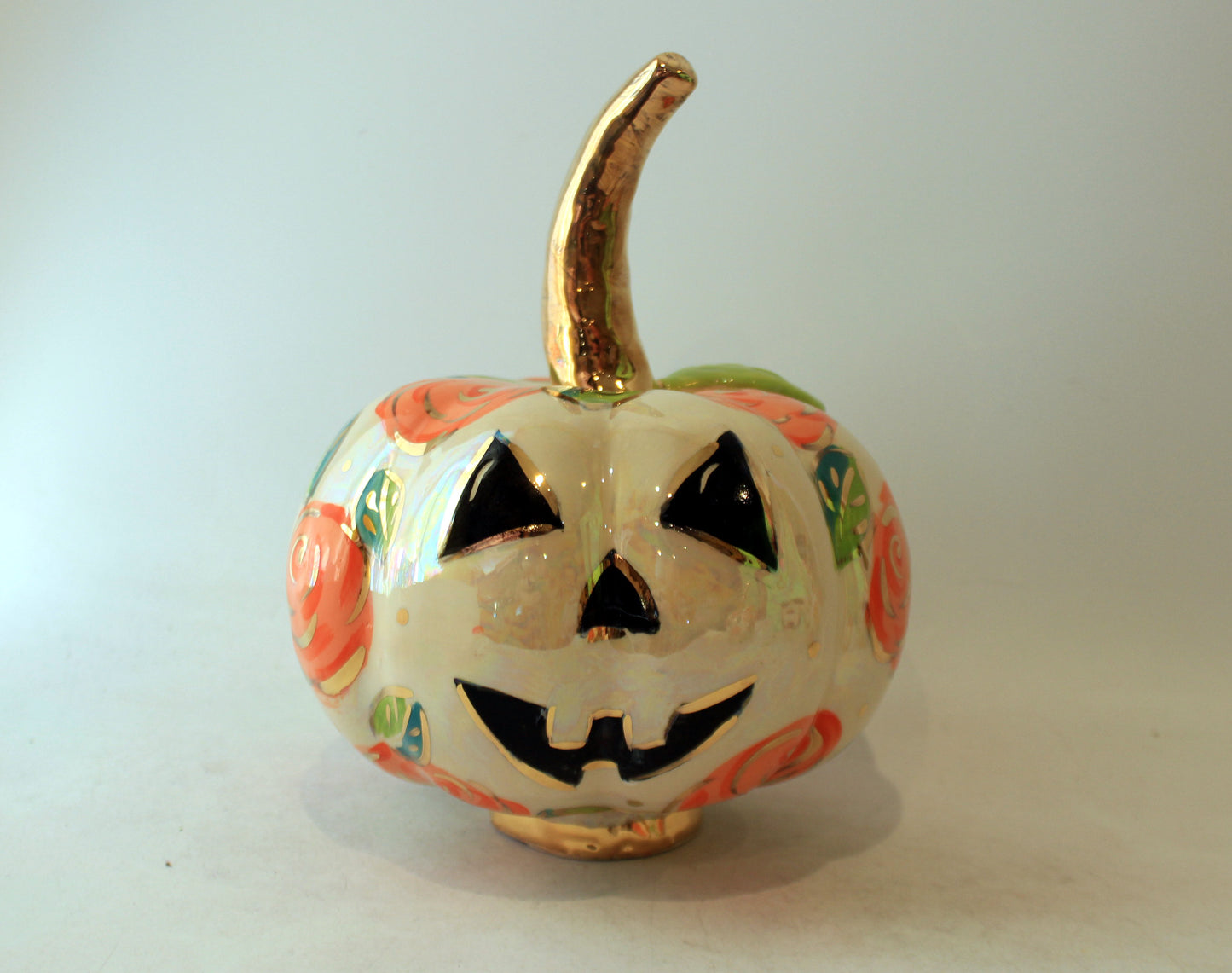 Large Pumpkin with Face and Orange Roses