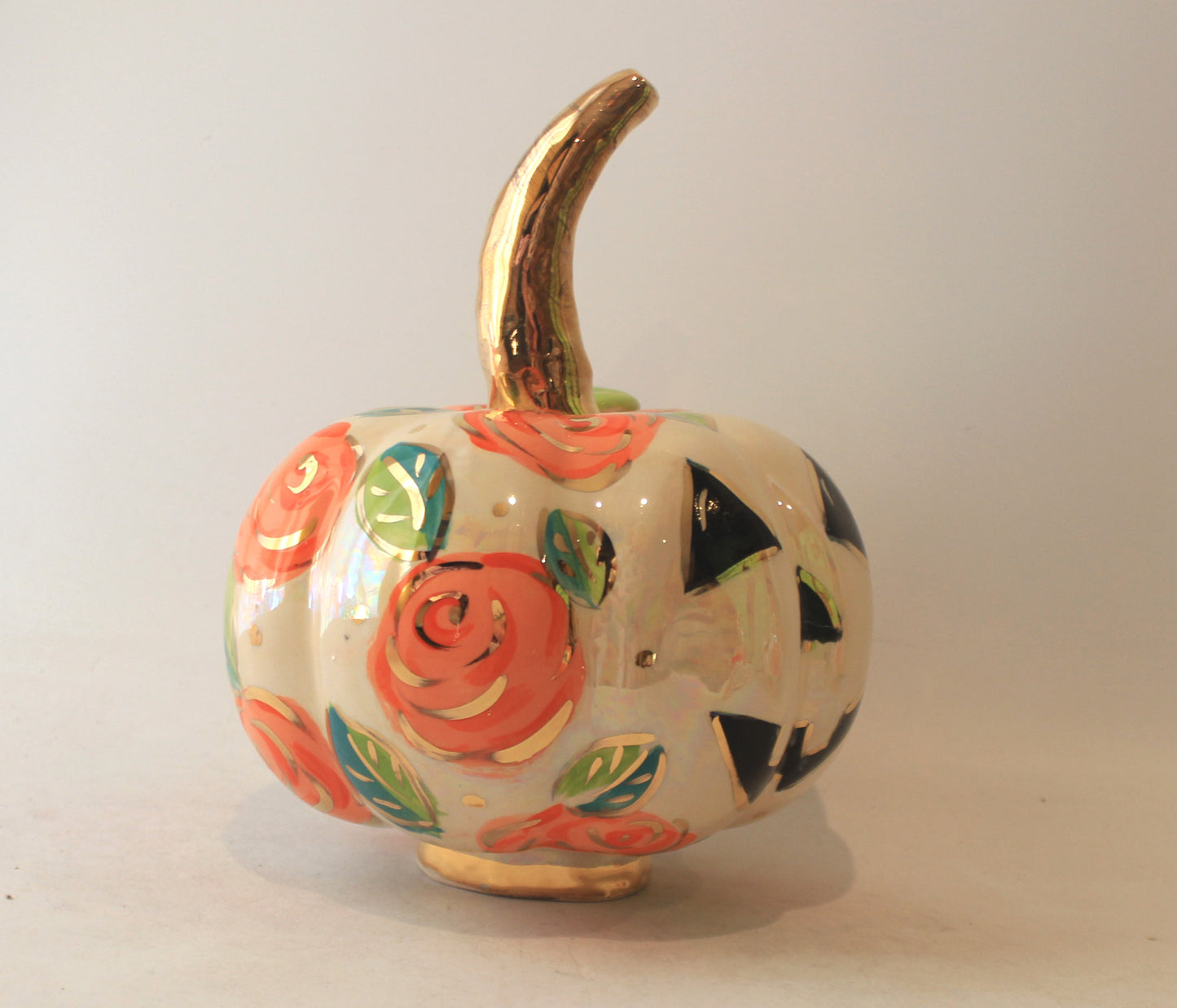 Large Pumpkin with Face and Orange Roses