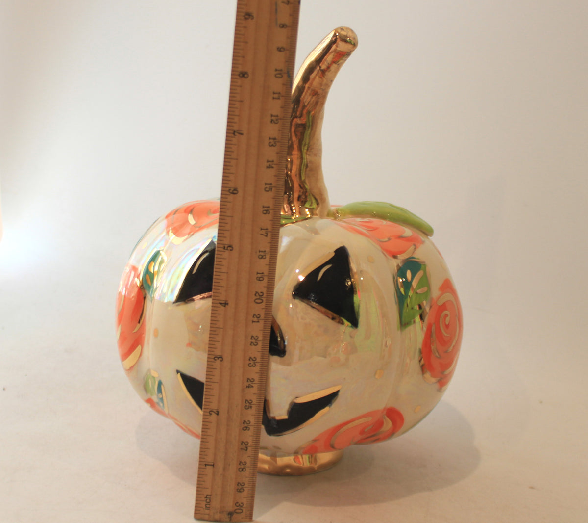 Large Pumpkin with Face and Orange Roses