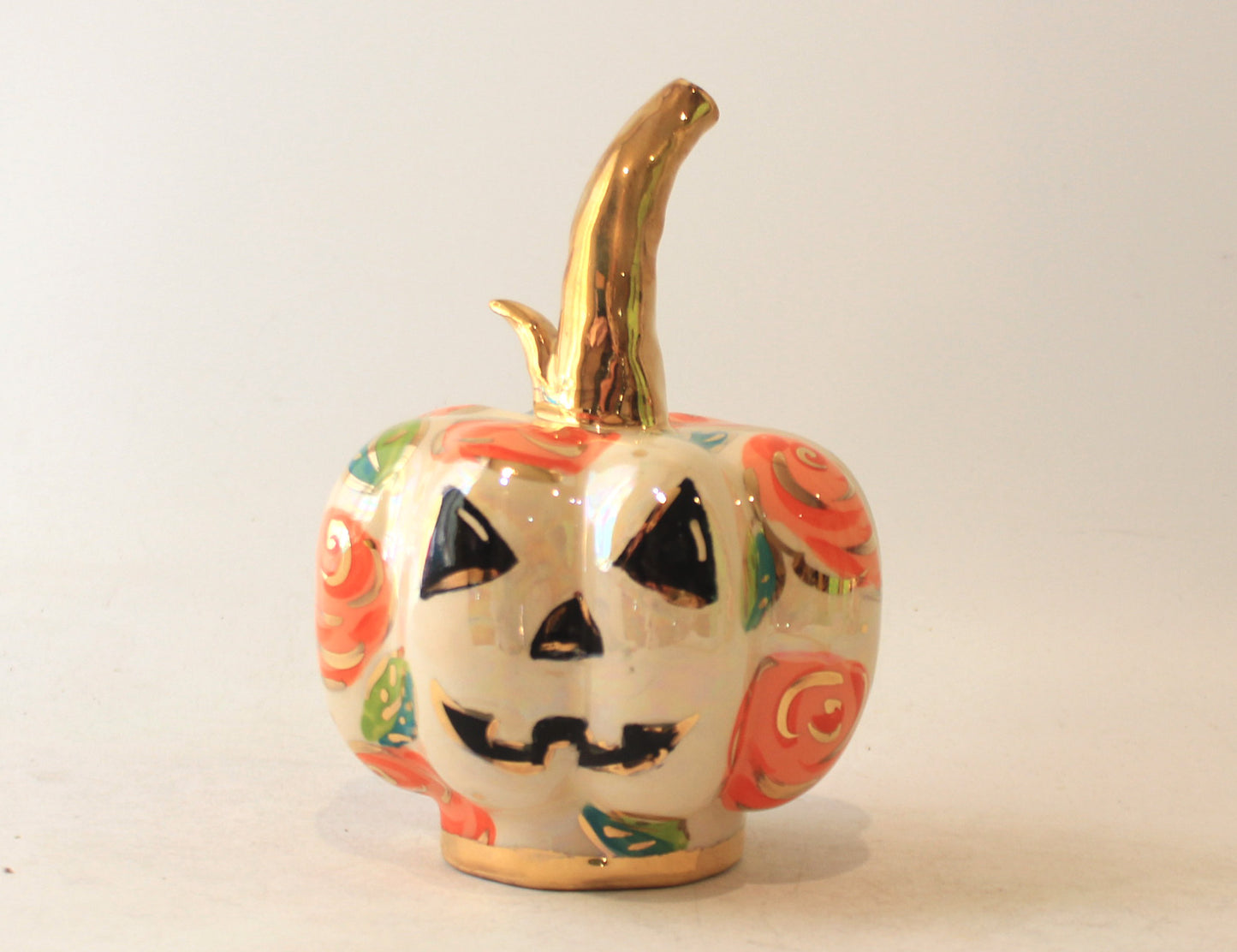 Small Pumpkin with Face and Orange Roses