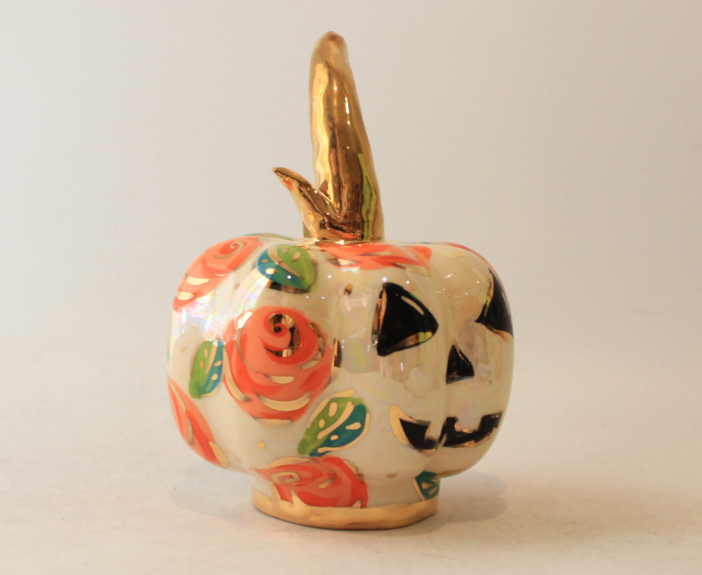 Small Pumpkin with Face and Orange Roses