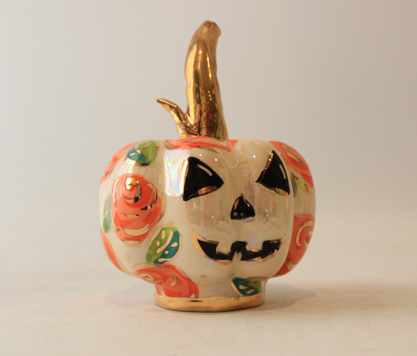 Small Pumpkin with Face and Orange Roses