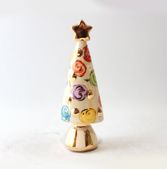 Small Christmas Tree in Rosebud with a Gold and White Striped Base